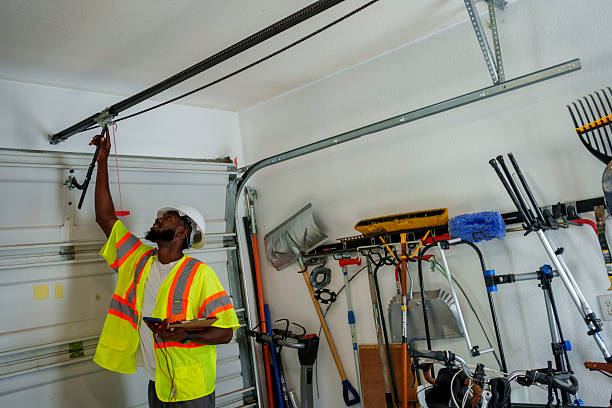 Professional Garage Door Panel Replacement technician working in Dresser, WI